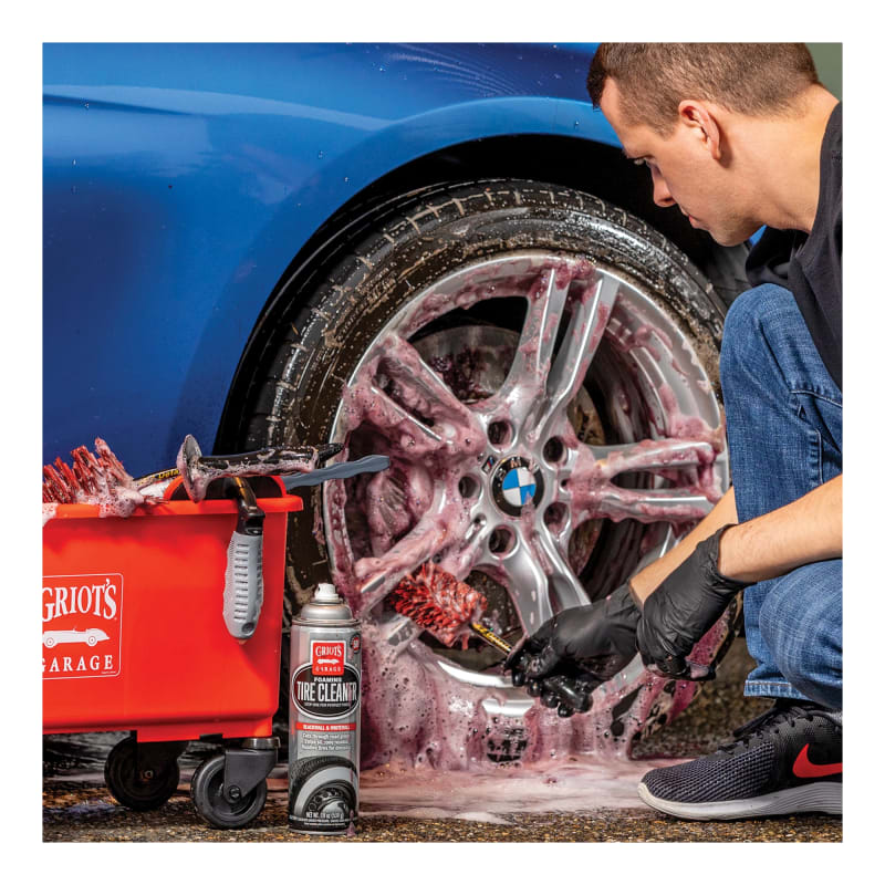 Wheel brush cleaner outlet